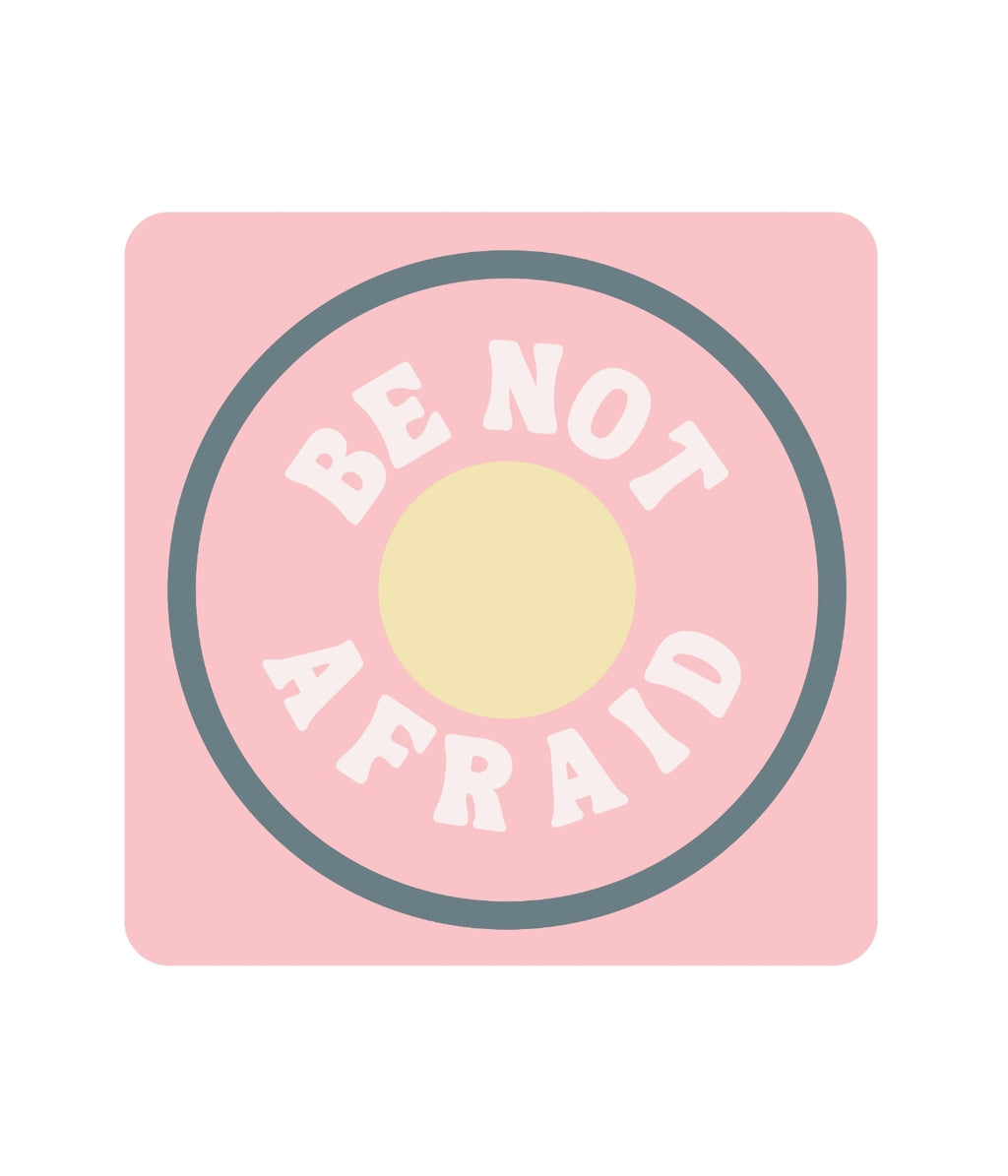 Pink square with a yellow circle and text 'BE NOT AFRAID' on a white background